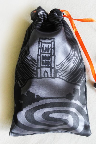 Glastonbury Tor Pouch, Mystical Avalon Tower on Hill with Glastonbury Spiral White Spring - Dark Grey Satin Pouch with Orange Details - Hand Printed with Hand Carved Lino Stamp