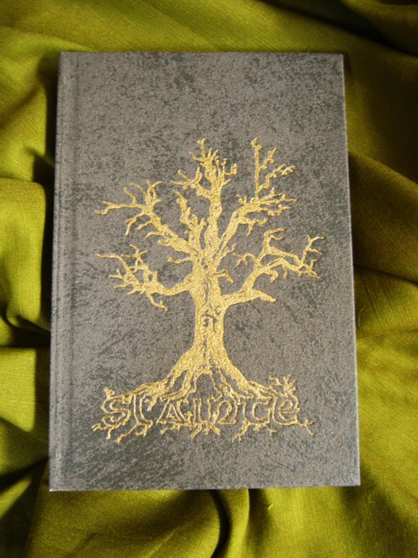 Sláinte - A Hand Printed and Hand Bound Book of Traditional British Folk Songs created using Metal Moveable Type and Stereotype Plates/Cliché Plates - Tree Cover Design - Bookmaking by Imogen Smid and Anouk Essers